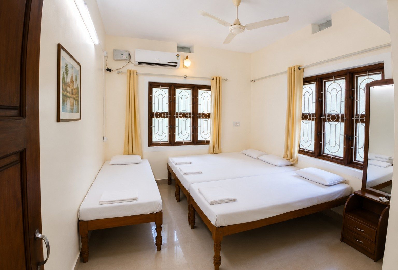 SriNidhi Apartment bedroom at Balakrishna Udupi Homestay